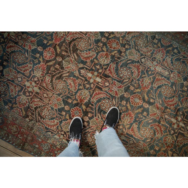 :: Allover covered field in an oversized Herati design motif with abrashes across. Colors and shades include: Navy blue,...