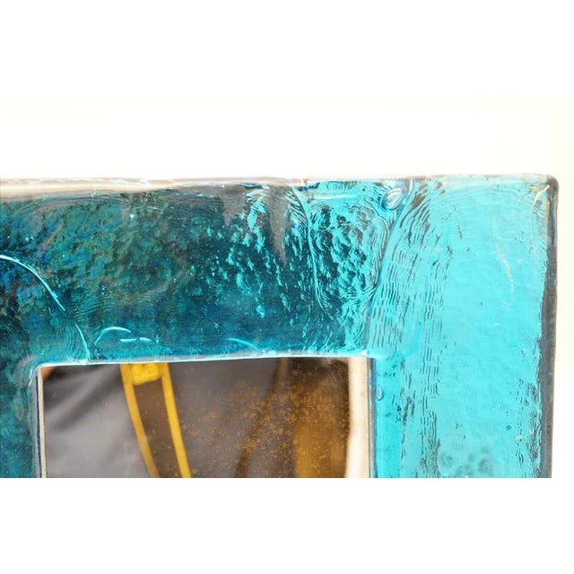 This pair of frames with a mirror was designed by Livio Seguso-Murano during the 1970s. The frames are made from thick...