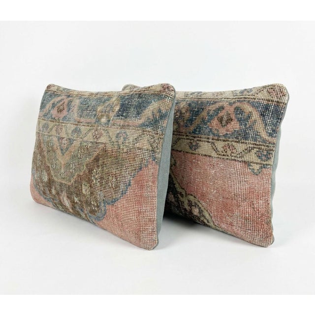 This beautiful 16'' x 24'' pillow cover set was made from authentic Turkish rug pieces. Bright colors of wool adorn the...