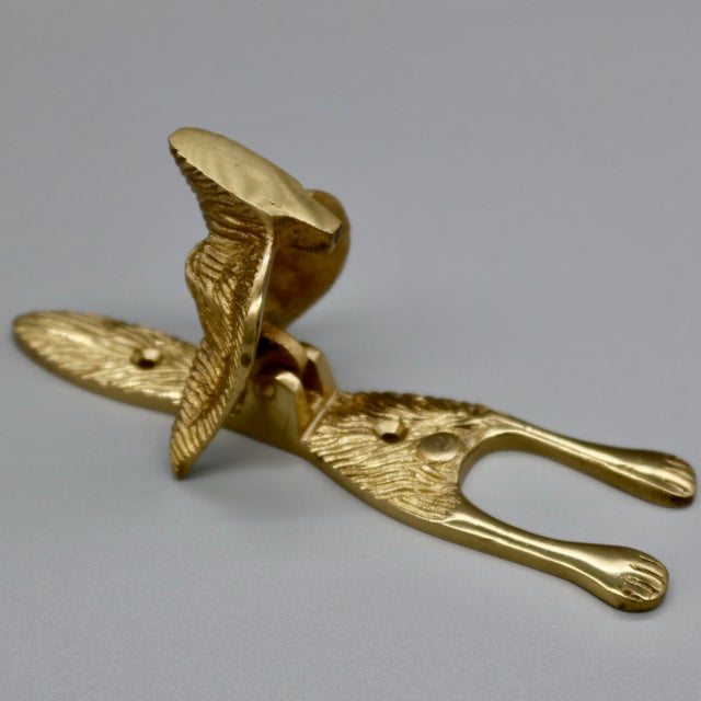 A charming vintage brass fox head door knocker with exceptional detail. Heavy, solid construction with a satisfying weight...