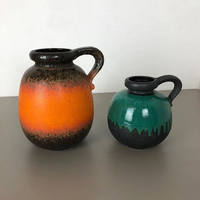 Article: Set of two fat lava art vases model: 484-30 and 484-21 Producer: Scheurich, Germany Decade: 1970s Description:...