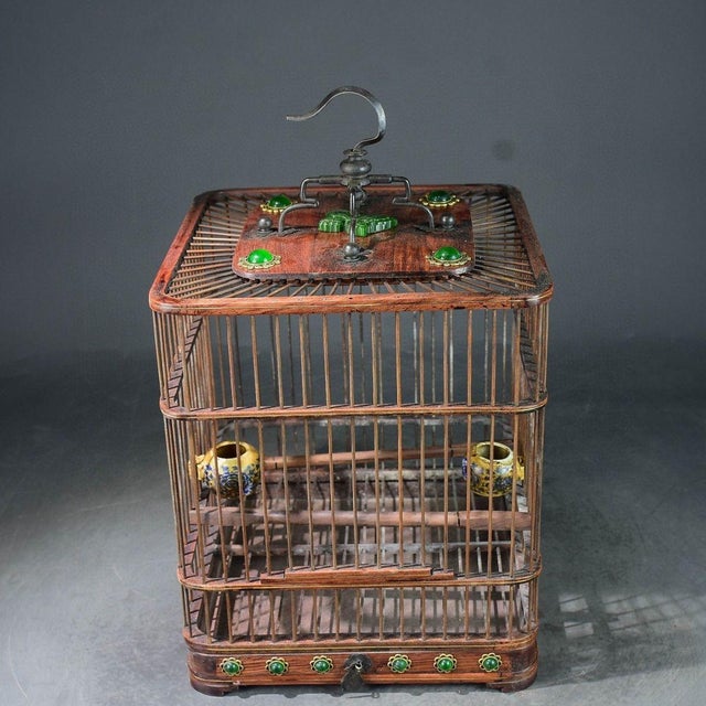 This is a stunning vintage Chinese Huali (Rosewood) birdcage, exemplifying the refined craftsmanship of traditional...