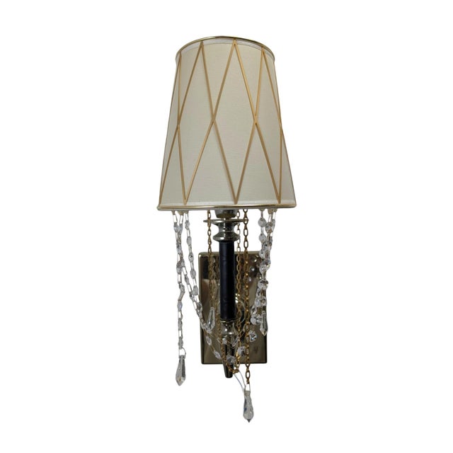 This pair of wall sconces is by the prestigious Italian design brand Visionnaire (Luxury Living Group). The style is...