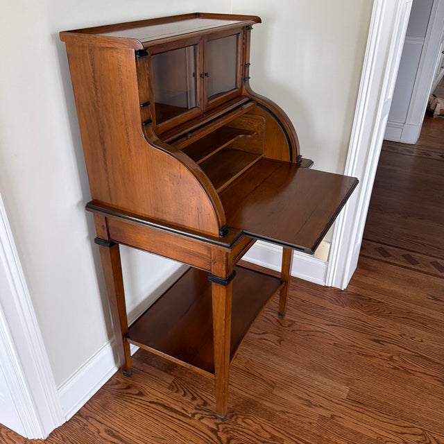Mint condition French Heritage secretary made of walnut- slight insignificant edge skinning on desk tray.