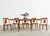 Exceptional set of six French art deco gondola dining chairs crafted from radiant mahogany. The chairs are made in the...
