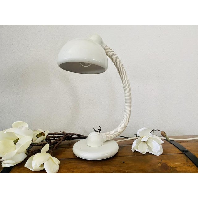 Model V3925/01 Table Lamp by Klaus Hempel for Hustadt, 1970s, in Good conditions. Designed 1970 to 1979 This piece has an...