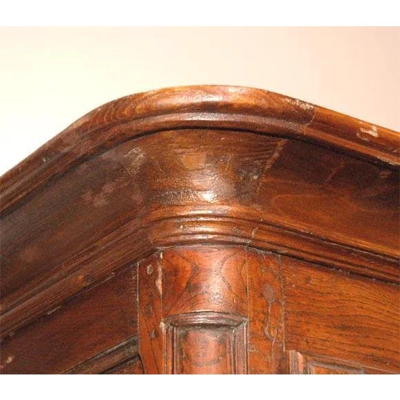 This antique armoire has raised and fielded panels in the doors and sides. While in good condition one door does have a...