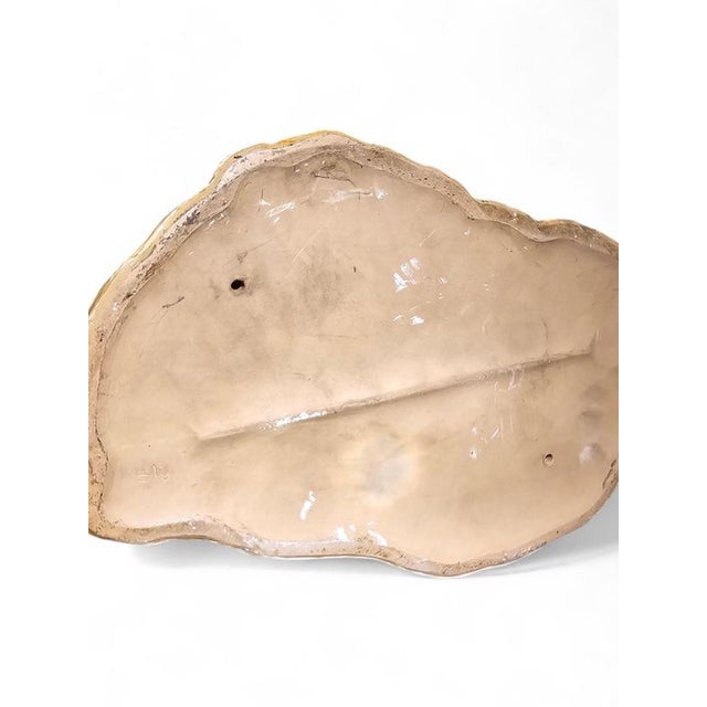 This impressive large sculpture depicts a shepherd carrying a lamb on his shoulders. The piece is notable for its realism...