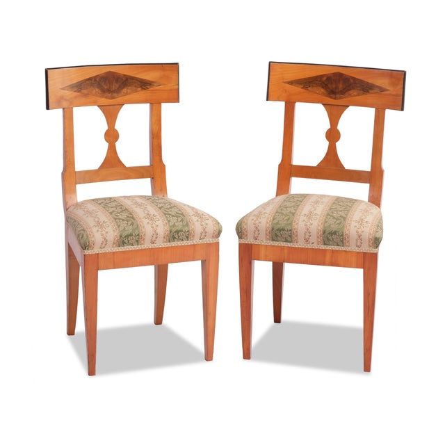 Set of four chairs Biedermeier, circa 1830, Northern Franconia, solid and veneered cherry wood, walnut inlay Patina...