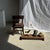 Small antique Indonesian teak bench. Made of solid antique teak, the natural imperfections of the wood (irregularities,...