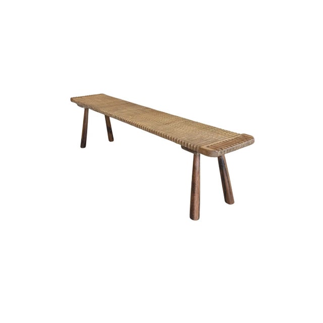 Crafted from reclaimed solid teak, this sculptural bench celebrates the raw beauty and enduring character of natural...