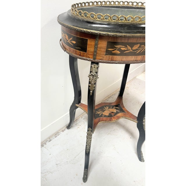 Napoleon iii ebonized wood planter four cabriole legs in ebonized wood decorated with brass palmettes marquetry shelf with...