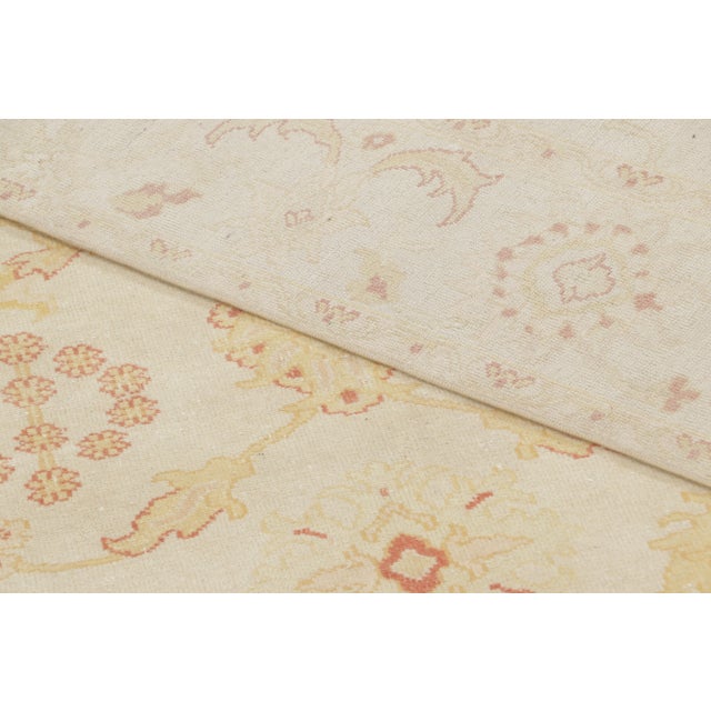 Hand-knotted in premium wool and originating from Egypt, this 8x10 modern rug is inspired by antique Persian rugs of...