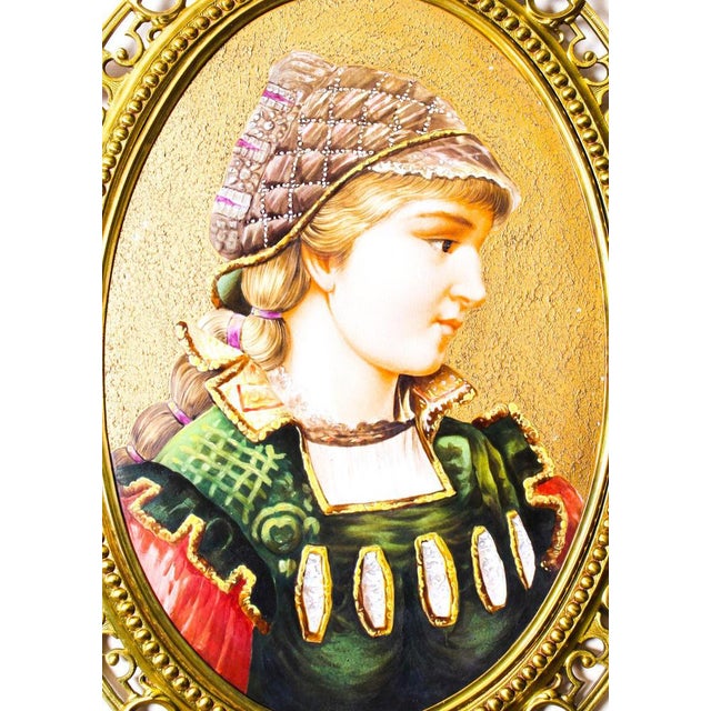 This is a stunning and unique antique Berlin framed porcelain plaque, circa 1870 in date. This magnificent plaque is oval...