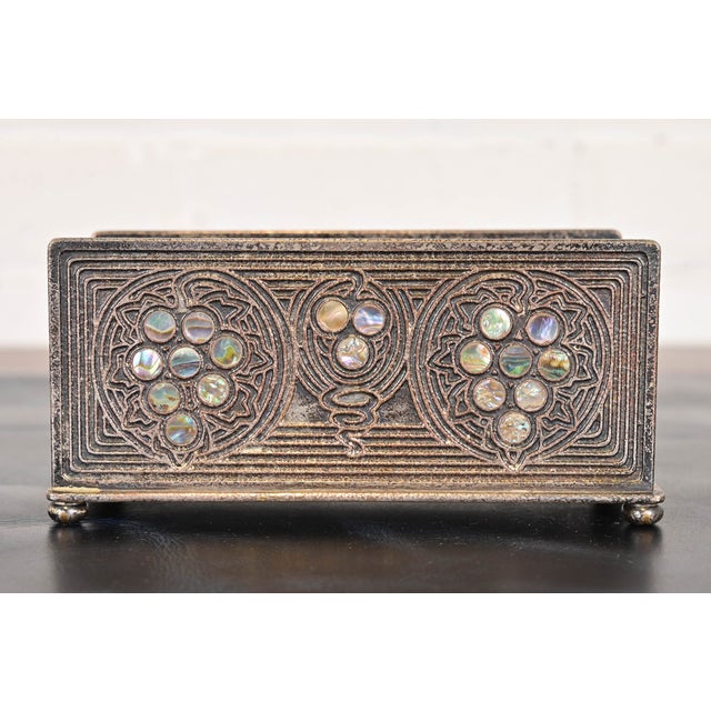 A gorgeous Art Nouveau or Art Deco period silvered bronze and inlaid abalone letter rack By Tiffany Studios (signed to the...