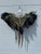 This custom-made bohemian-style statement piece is a masterfully crafted work of wearable art, equally stunning as a...