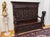 Representative neo-Renaissance bench with rich figural and plant carvings, made of solid oak wood. It dates from the end...