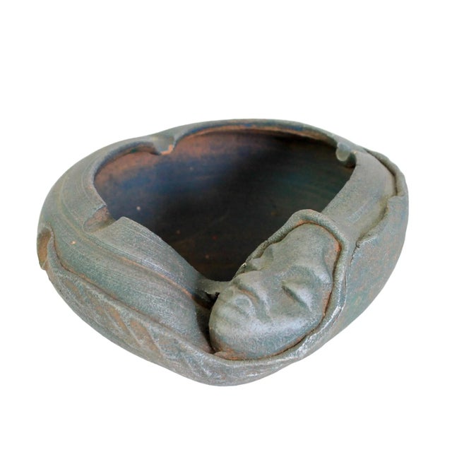 Jamaican studio art pottery African female face ashtray or catchall by artist P. Mykoo. Dated 2006. Some small chips....