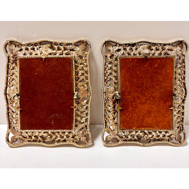 Beautiful set of 2 vintage ornate picture frames featuring intricate filigree metalwork, floral motifs, and elegant silver...