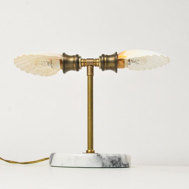 An incredible little unique table lamp perfect for the bedside or bathroom as it takes nightlight bulbs. Features a marble...