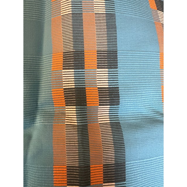 A bright piece of fabric from Osborne and Little perfect for a pillow or small cushion heavy weight