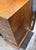 This Vintage Burlwood Campaign Kneehole Desk is a distinguished and classic piece with a lot of nuanced character and...