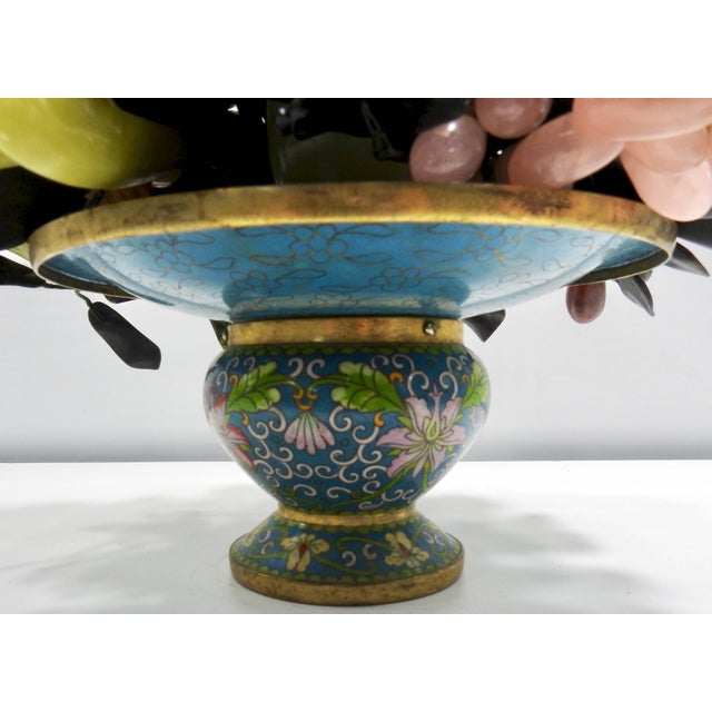 Words cannot describe the beauty of this stunning arrangement. The colors of the stone that make up the fruit varieties...