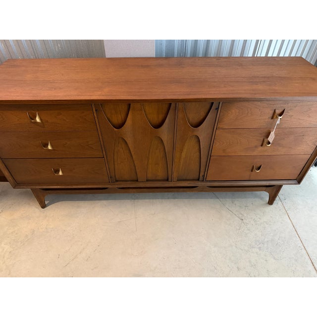 An iconic Broyhill Brasilia triple dresser from the highly sought-after Brasilia collection. Known for its sculptural...