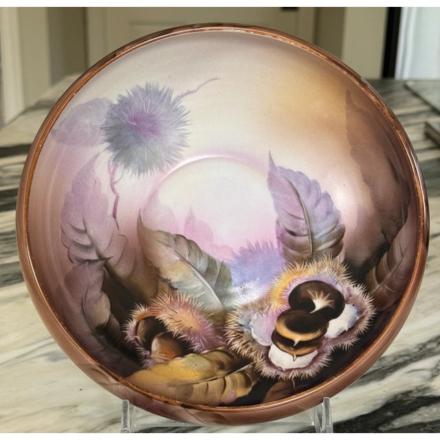 Val's Dollhouse is proud to present this near-antique hand painted Noritake Morimura Chestnut motif decorative bowl....