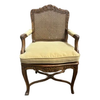 Carved and Caned Fauteuil Chair With Cushion For Sale