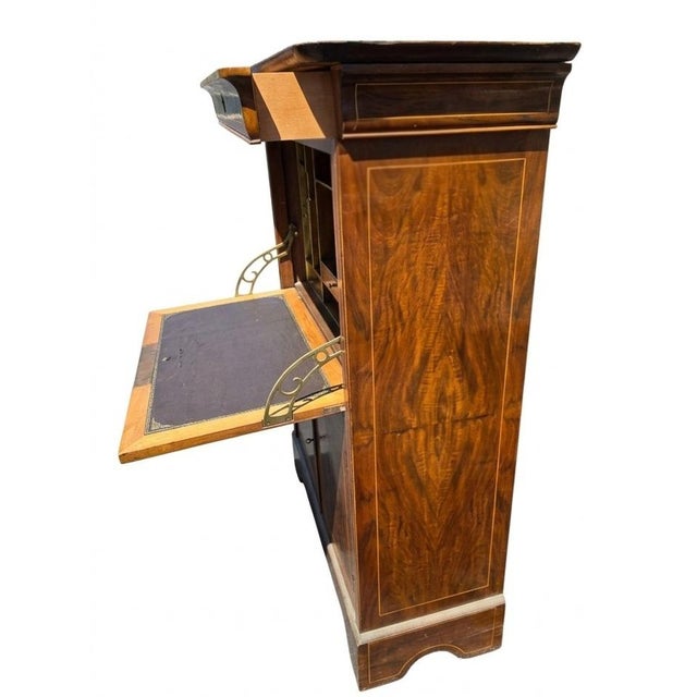 A French Louis Philippe Burr Walnut Secrétaire à Abattant is a classic 19th-century fall-front writing desk and chest....
