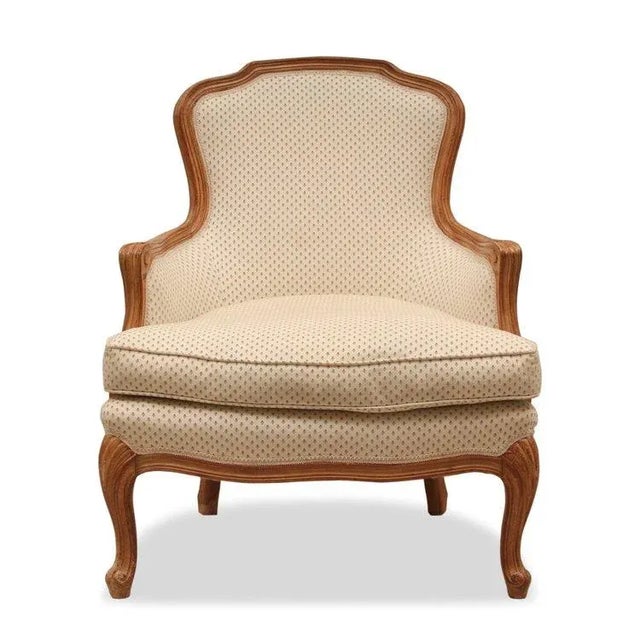 Indulge in the romantic elegance of this Vintage French Louis XV Style Walnut Armchair, a superb addition to any curated...