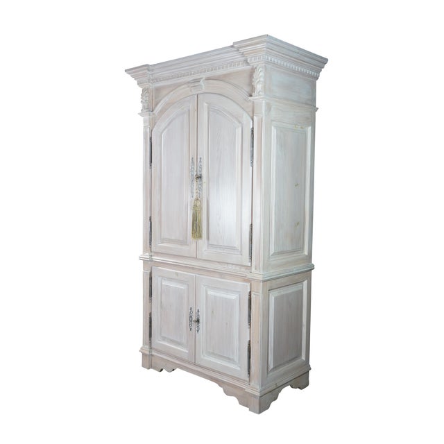 Attributed to Link-Taylor, this Pickled Oak Media Cabinet / Armoire is an elegantly proportioned, two-piece wooden...