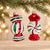 A festive pair of glass Christmas ornaments designed as wrapped candies. Finished in reflective red and emerald green with...