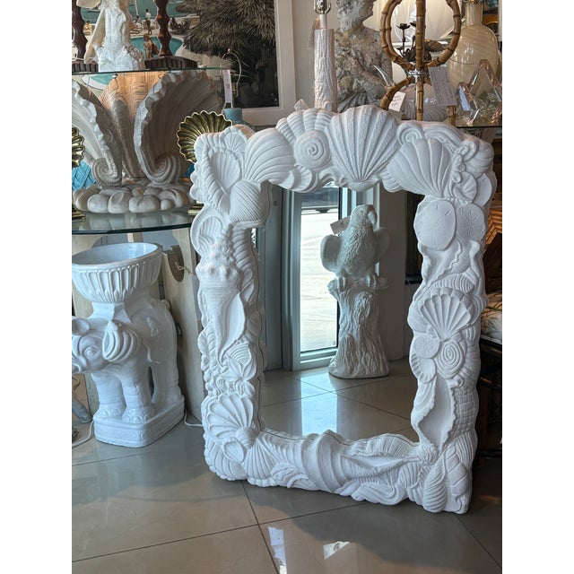 Lovely vintage plaster shell seashell Palm Beach wall mirror. Newly finished in a flat plaster white. Comes ready to hang....