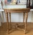 This elegant French Louis XVI Style table features a removable oval marble top and is adorned with various carved...