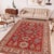Enhance your home with this exquisite hand-knotted Super Kazak rug, crafted from fine hand-spun wool and dyed with all-...
