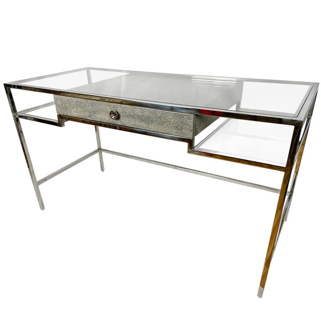 Contemporary writing desk by Theodore Alexander in stainless steel and tempered glass with single drawer in blue mottled...