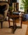 An elegant and richly detailed occasional table by Michael Taylor Designs, showcasing the designer’s signature blend of...