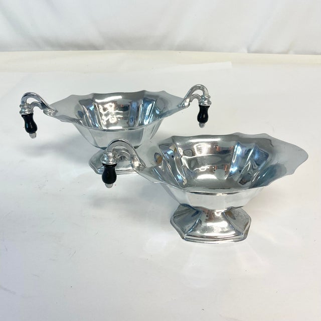 A great tribute to America’s Art Deco Era. This creamer and sugar set is metal with a Chrome like finish with black...