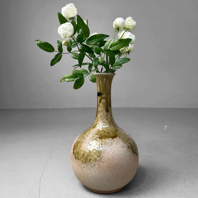Elegant Japanese vase, crafted in the renowned Shigaraki region, one of the six classical pottery centers of Japan....