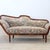 Antique Italian sofa or chaise longue dating back to the mid-19th century. The sofa features a solid walnut frame and a...
