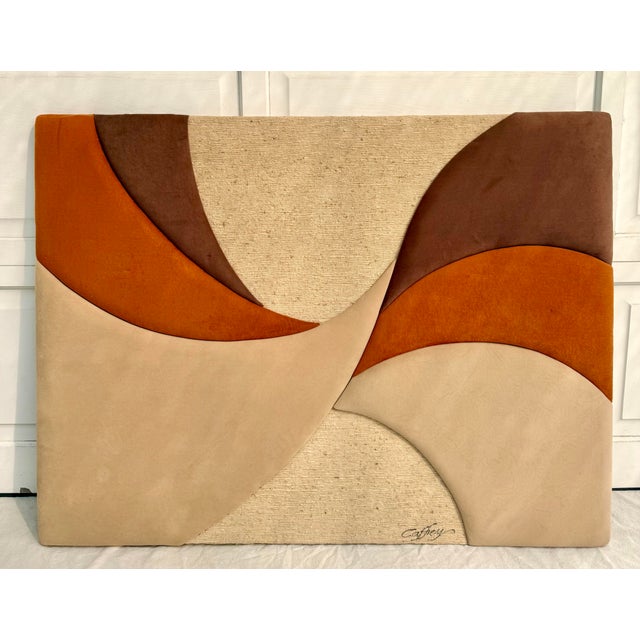 Here is a striking vintage textile wall sculpture by Susan Caffrey of The Soft Sculpture Studio, likely dating to the...