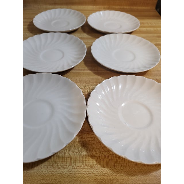 Pretty set of vintage Johnson Brothers English ironstone plates in the Athena fluted pattern. The plates are bread plates,...
