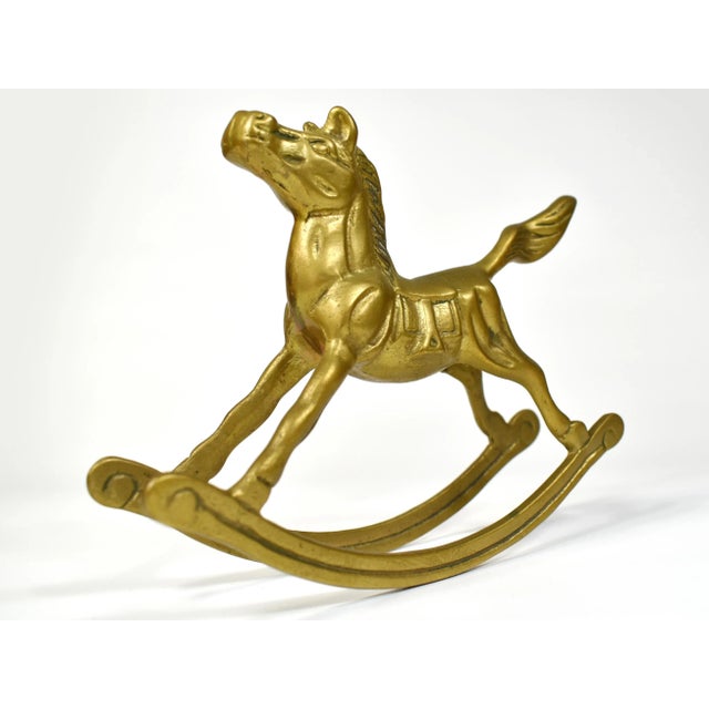 Adorable solid brass rocking horse figurine in great vintage condition. It is a prefect piece to add to your brass...
