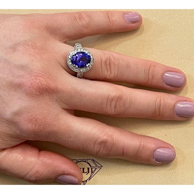 This extraordinary, 6 carat tanzanite is truly an extraordinary gemstone. There are total of 1.0 carats of shimmering...