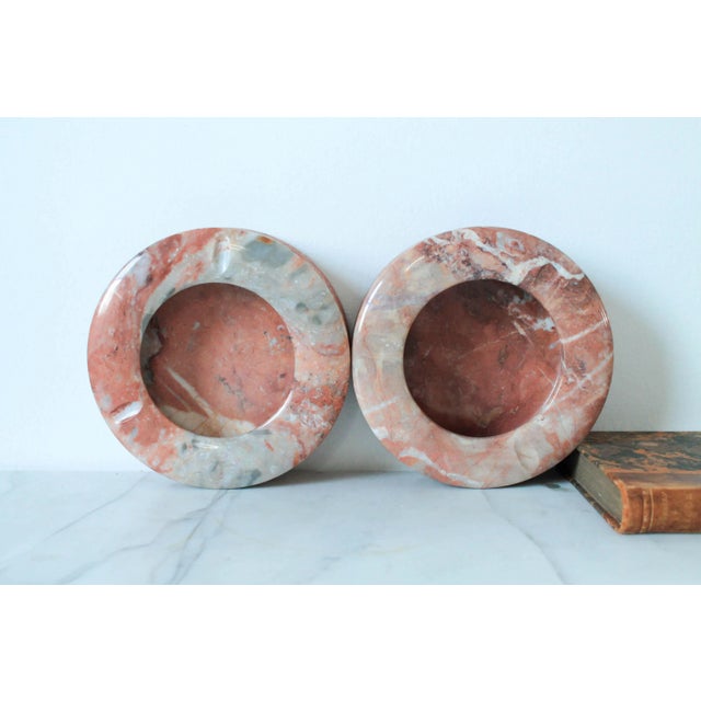 Beautiful pair of vintage natural onyx ashtray or catchalls in a rose taupe color. Makers mark on bottom. No chips.