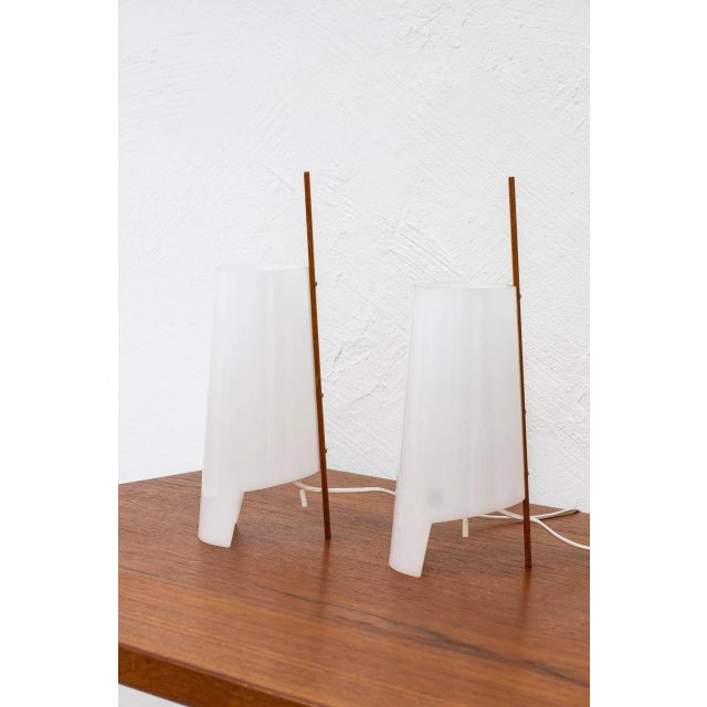 Table lamps model 748 designed by Hans Bergström. Produced by Ateljé Lyktan during the 1950s. Made from acrylic, teak and...