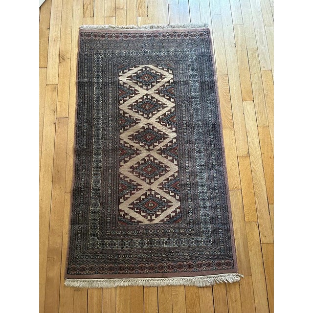 Hand-knotted wool rug, origin: Pakistan, 1970s Wear photographed