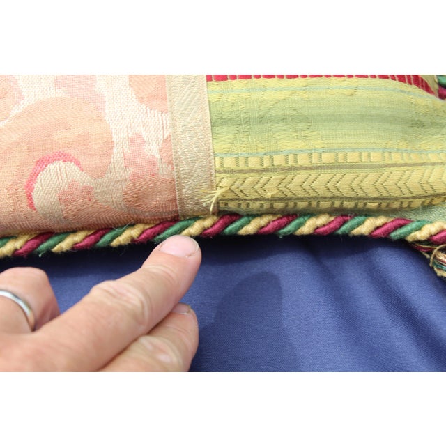 This is a Toscana patchwork pillow. The piece is from the late 20th century.